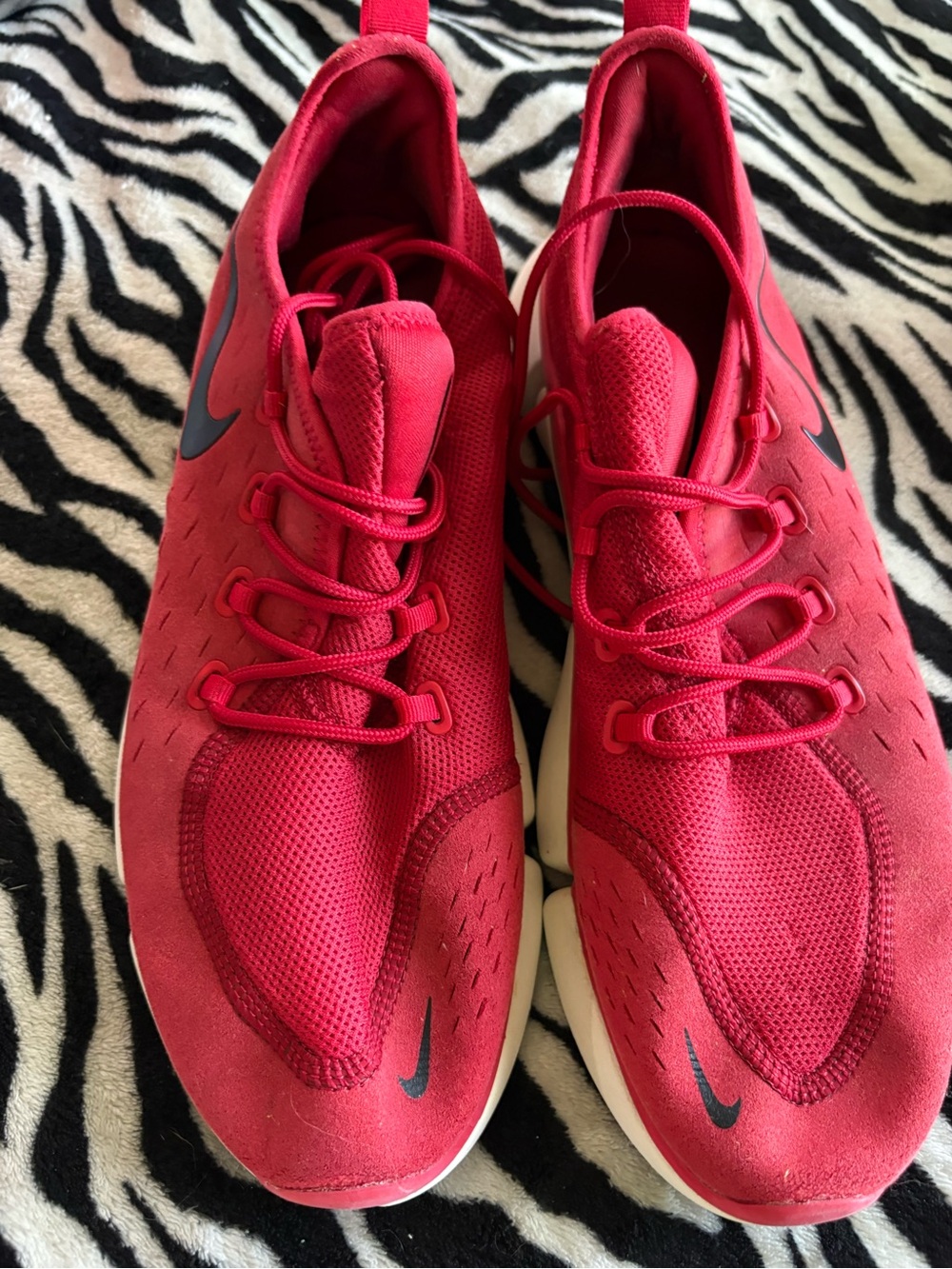 Nike Red Athletic Sneakers with Black Swoosh Accent